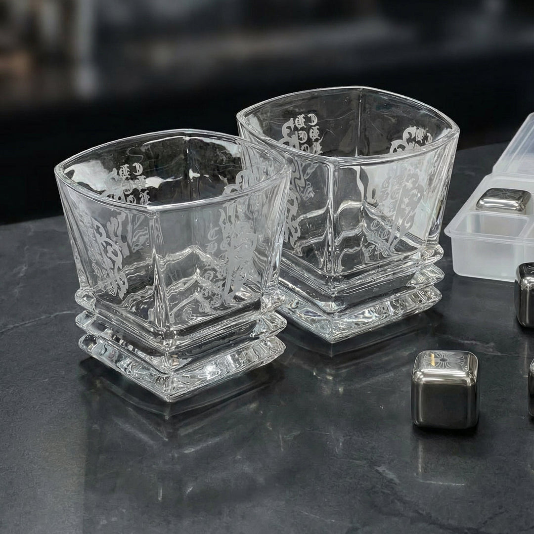 Luxury Midnight Manor whiskey gift set with two 300ml gothic glasses and laser-etched stainless steel cooling cubes on a black marble surface