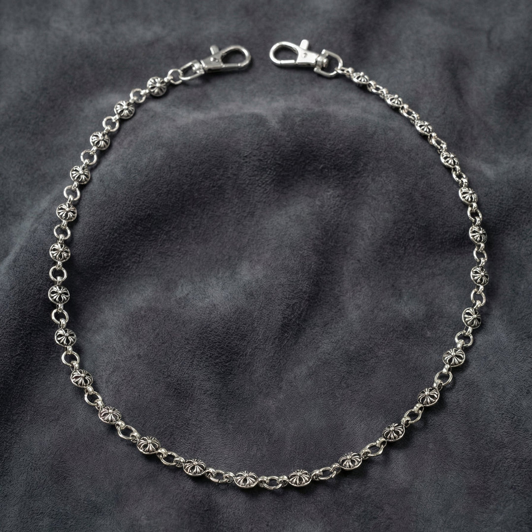 Secure your style with the 23" Manor Heirloom Chain. A handcrafted gothic cross wallet chain with an antiqued silver finish. Explore the Midnight Manor collection
