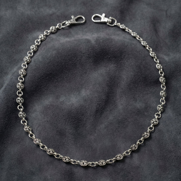 Secure your style with the 23" Manor Heirloom Chain. A handcrafted gothic cross wallet chain with an antiqued silver finish. Explore the Midnight Manor collection