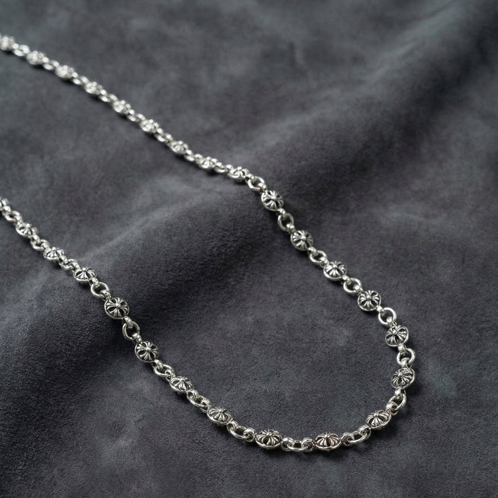 Secure your style with the 23" Manor Heirloom Chain. A handcrafted gothic cross wallet chain with an antiqued silver finish. Explore the Midnight Manor collection