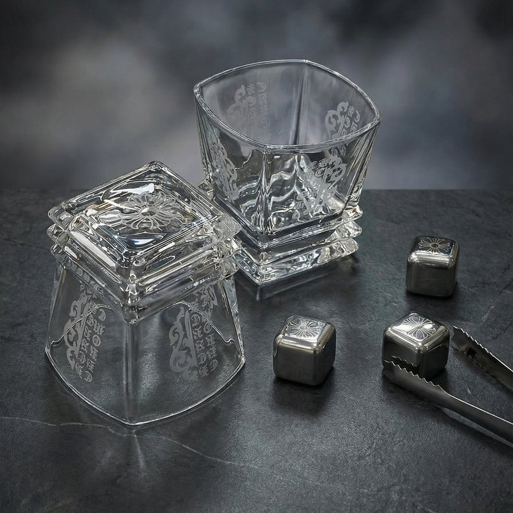 Luxury Midnight Manor whiskey gift set with two 300ml gothic glasses and laser-etched stainless steel cooling cubes on a black marble surface