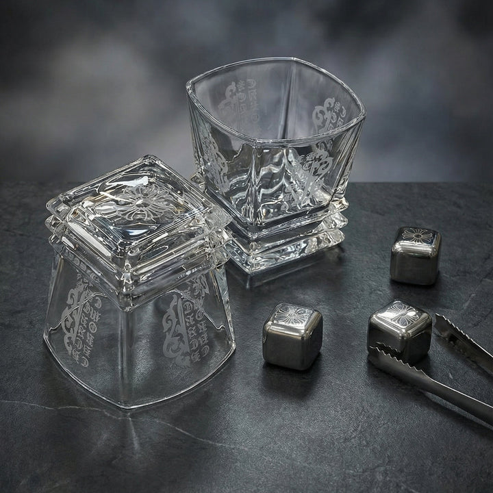 Luxury Midnight Manor whiskey gift set with two 300ml gothic glasses and laser-etched stainless steel cooling cubes on a black marble surface